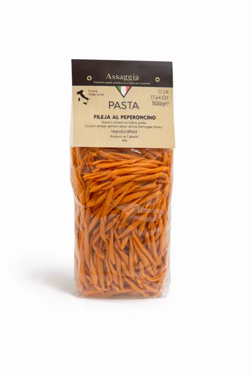 Orange pasta in clear packaging